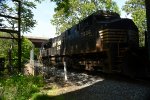 NS yard job E19 pauses over Blackwater Creek while conductor lines the switch to get into the interchange yard with cars for CSX